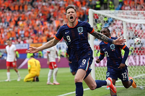 Wout Weghorst celebrates his side's second goal